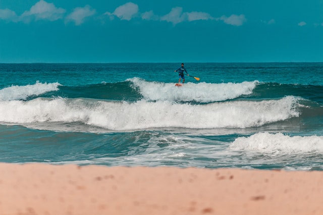 Man surfing on paddleboard